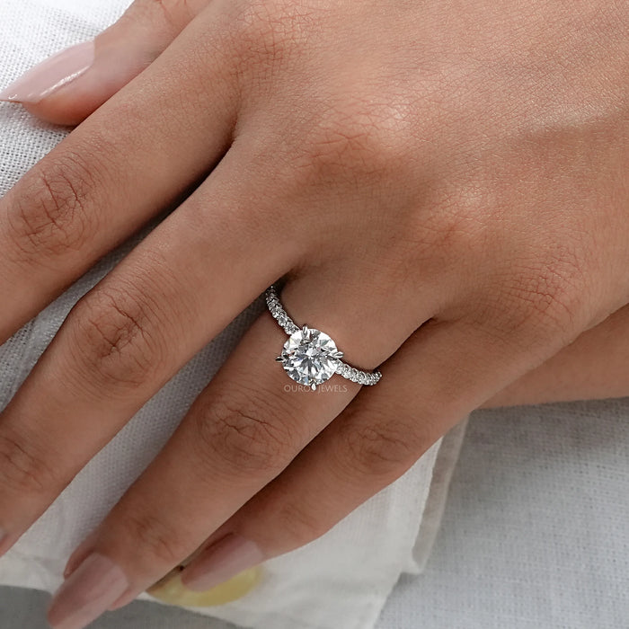 round lab-grown diamond white gold solitaire engagement ring on model's finger