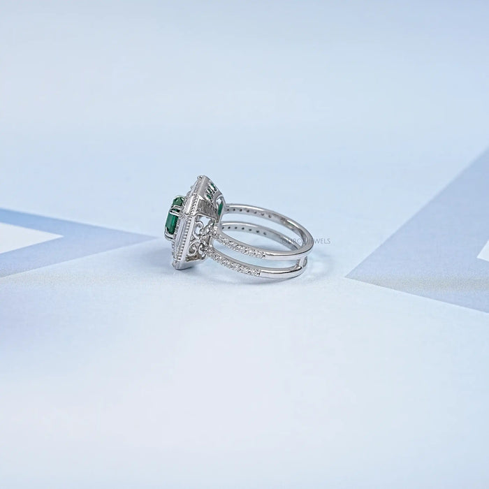 side view of green asscher cut lab gemstone diamond halo anniversary ring