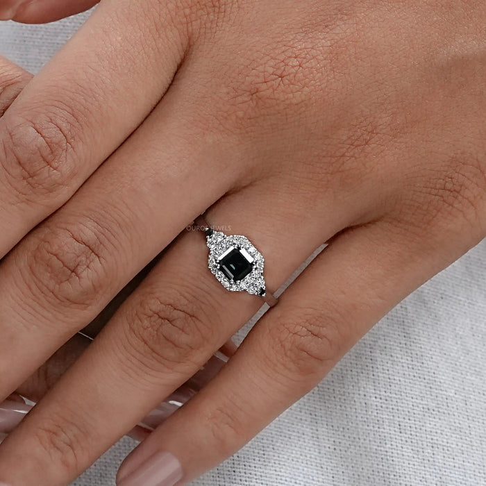 asscher cut black lab diamond halo engagement ring on model's hand