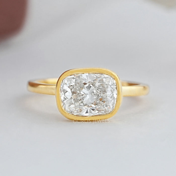 East West Cushion Diamond Bezel Set Solitaire Ring