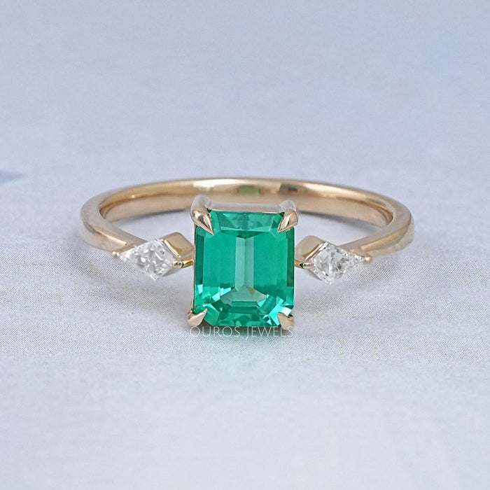 Emerald Gemstone And Kite Cut Three Stone Engagement Ring
