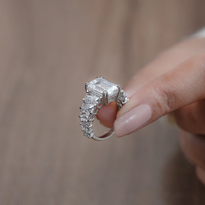 side view of emerald-cut lab diamond trapezoid solitaire accent engagement ring