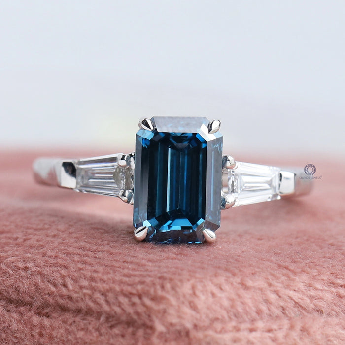 Emerald and Tapered Baguette Three Stone Diamond Ring