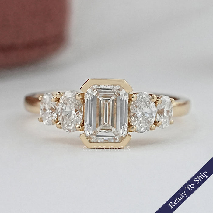 Half Bezel Emerald And Oval Five Stone Engagement Ring