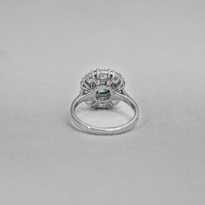 back view of green cushion cut lab diamond halo engagement ring