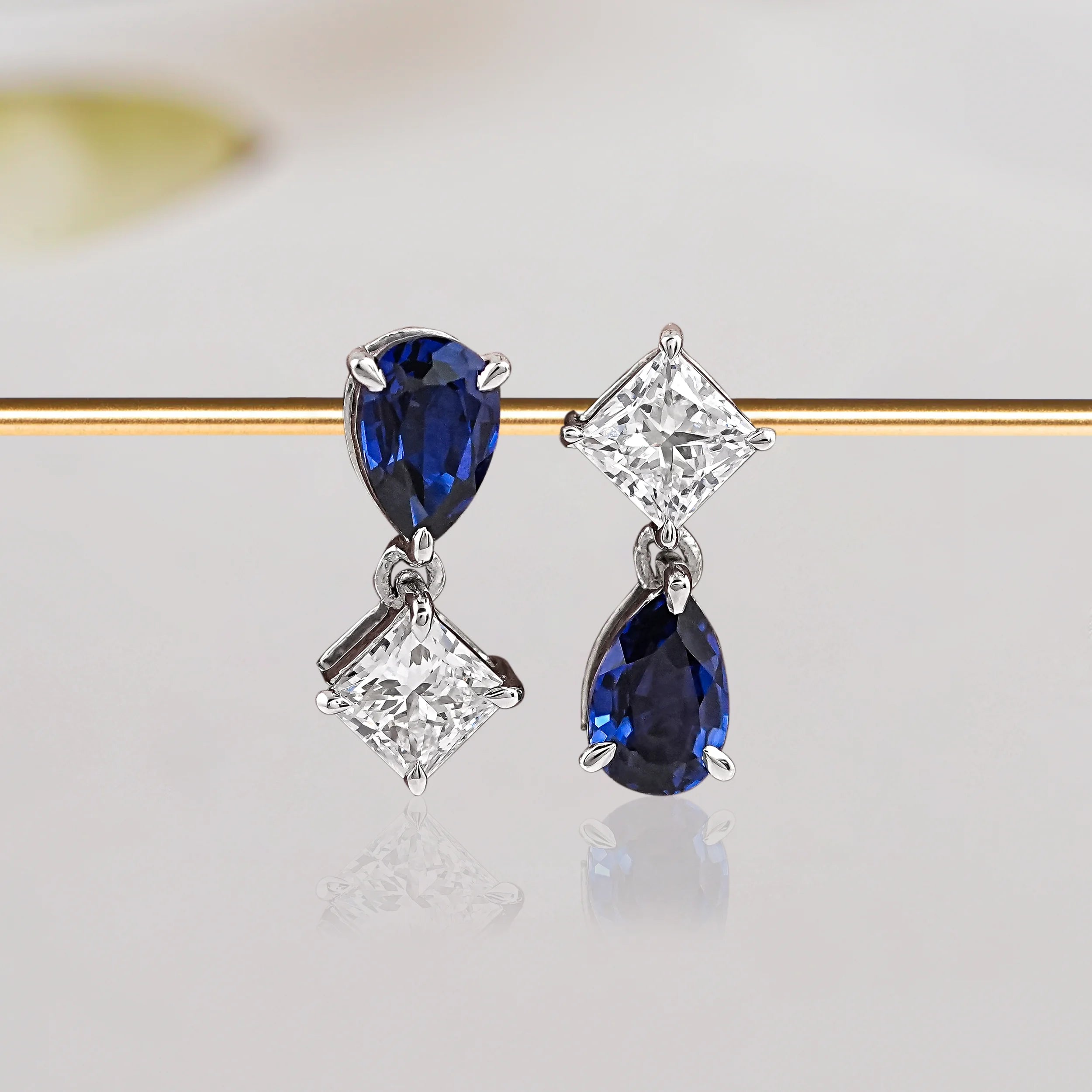 Pear Sapphire And Princess Drop Earrings