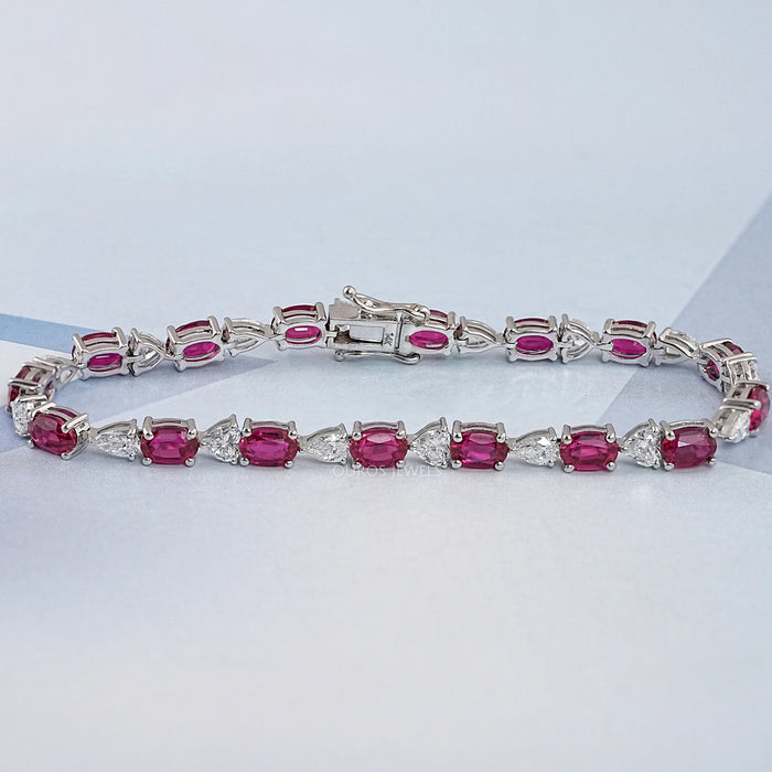 Oval Ruby and Lab Grown Diamond Tennis Bracelet