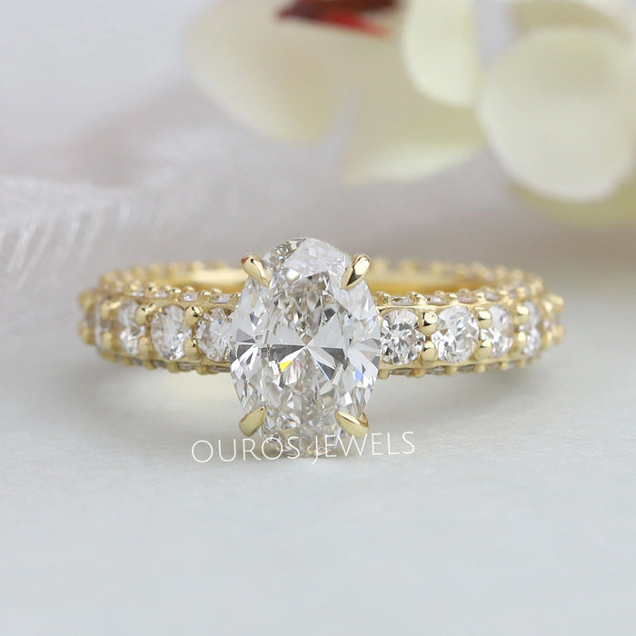 Oval-Cut Hidden Halo Engagement Ring with Diamond Accents