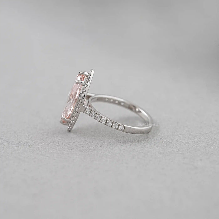 side view of pink marquise cut lab diamond halo engagement ring