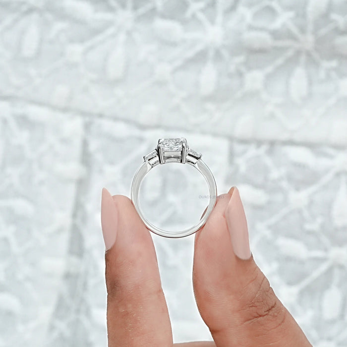 brilliant radiant cut and tapered baguette three stone wedding ring's close view