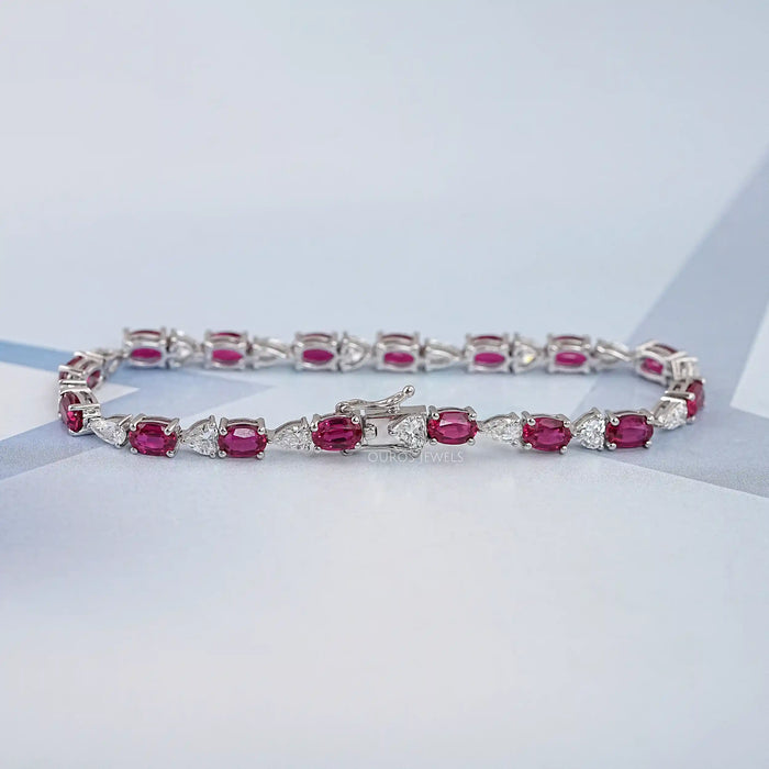 Oval Ruby and Lab Grown Diamond Tennis Bracelet