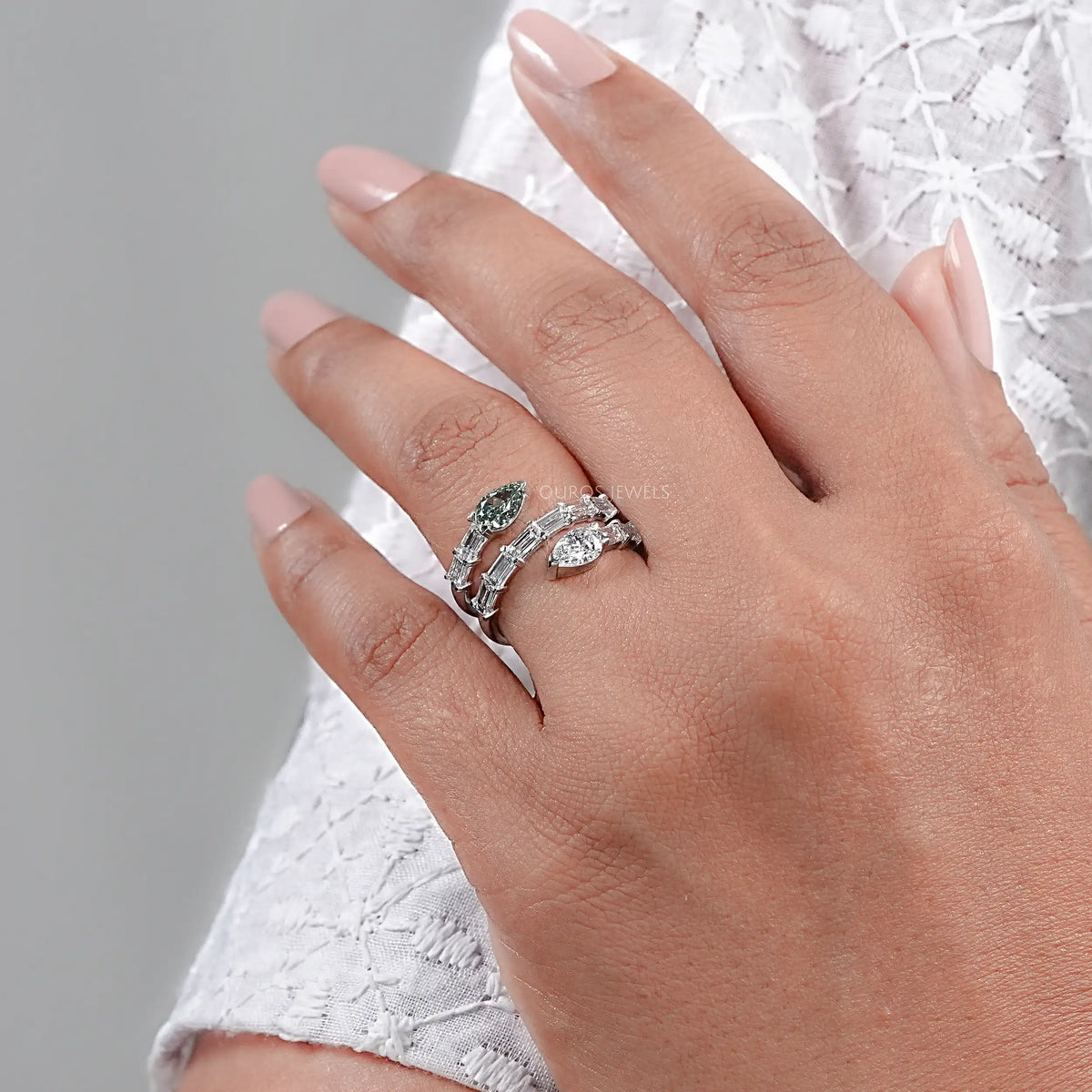Spiral Shape Baguette And Pear Diamond Ring
