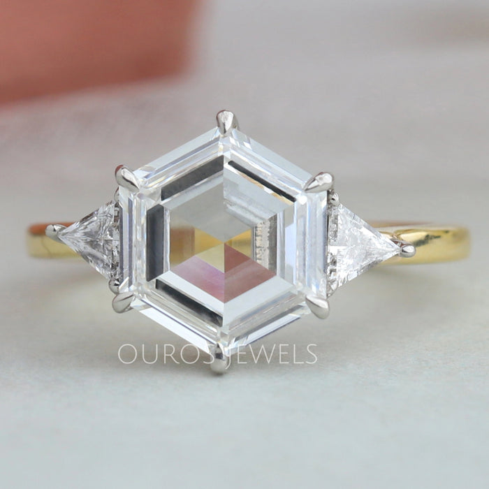 Three Stone Engagement Ring with a Hexagonal Step-Cut Diamond