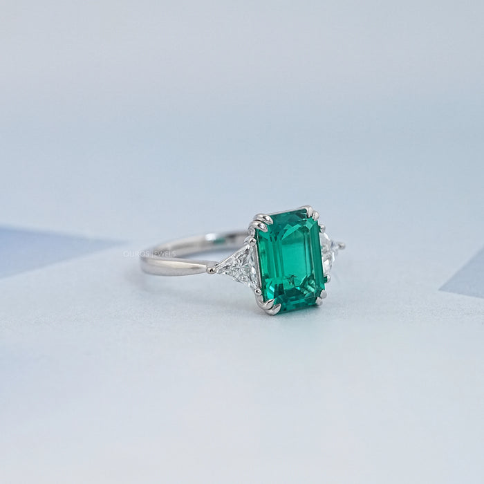 Emerald And Triangle Cut Trio Engagement Ring
