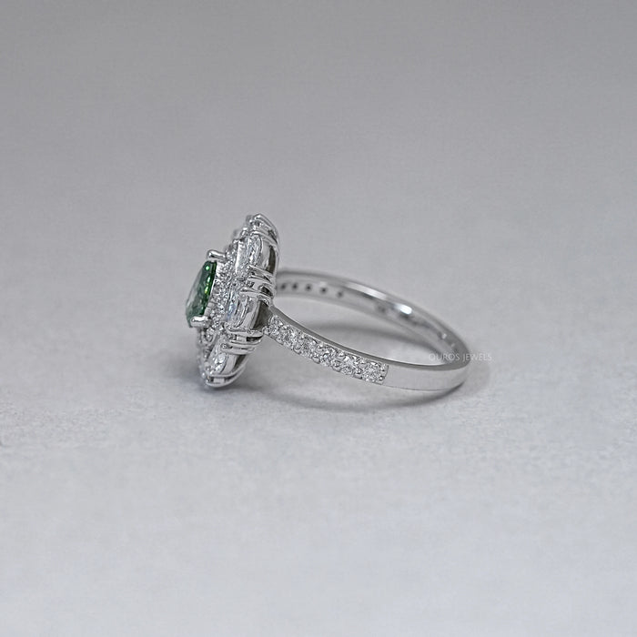 side view of green pear cut surround double halo diamond engagement ring