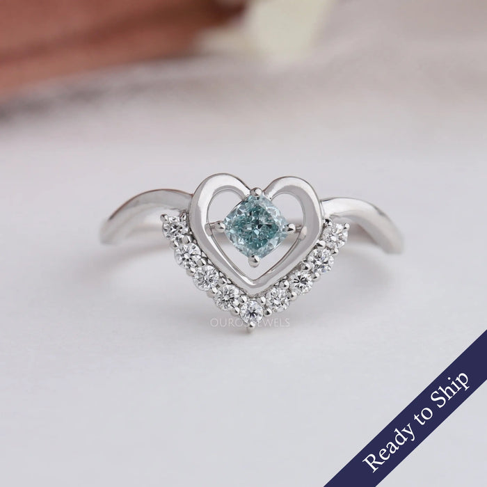 Front look of cushion cut engagement ring set in heart shaped style, crafted with side small round diamonds & 14k white gold.