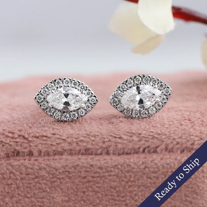 Brilliant marquise cut lab grown diamond earrings surrounded with halo of round diamonds set in 14k white gold