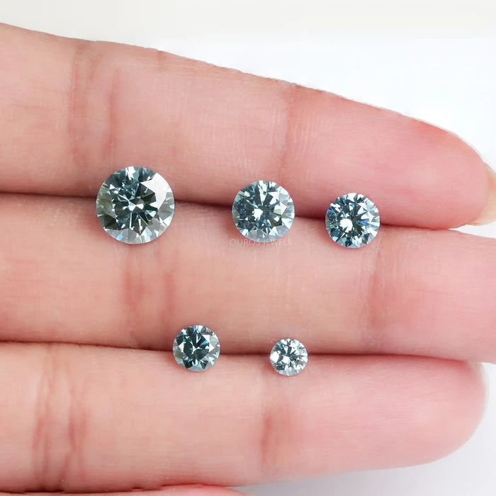 blue round cut lab created colored diamonds loose on finger view
