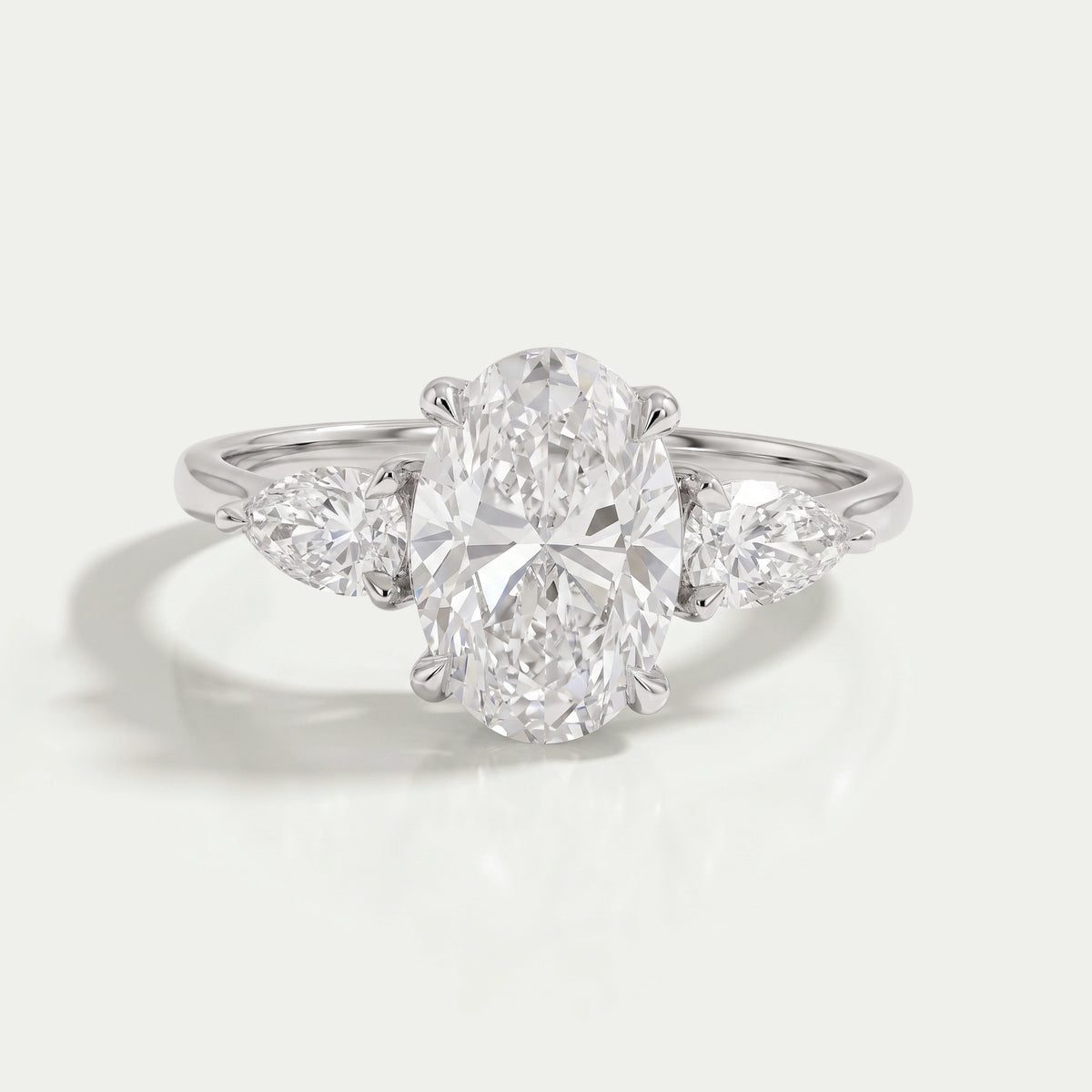 Three Stone Oval Shape Lab Grown Diamond Ring