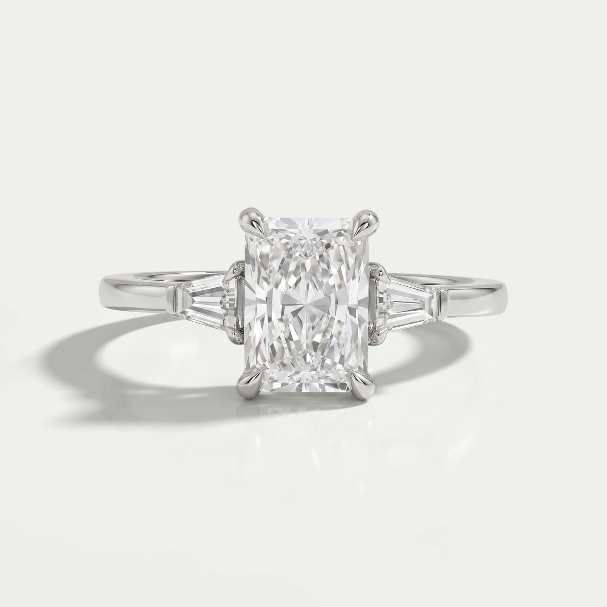 Brilliant Radiant Cut And Tapered Baguette Three stone ring Rings