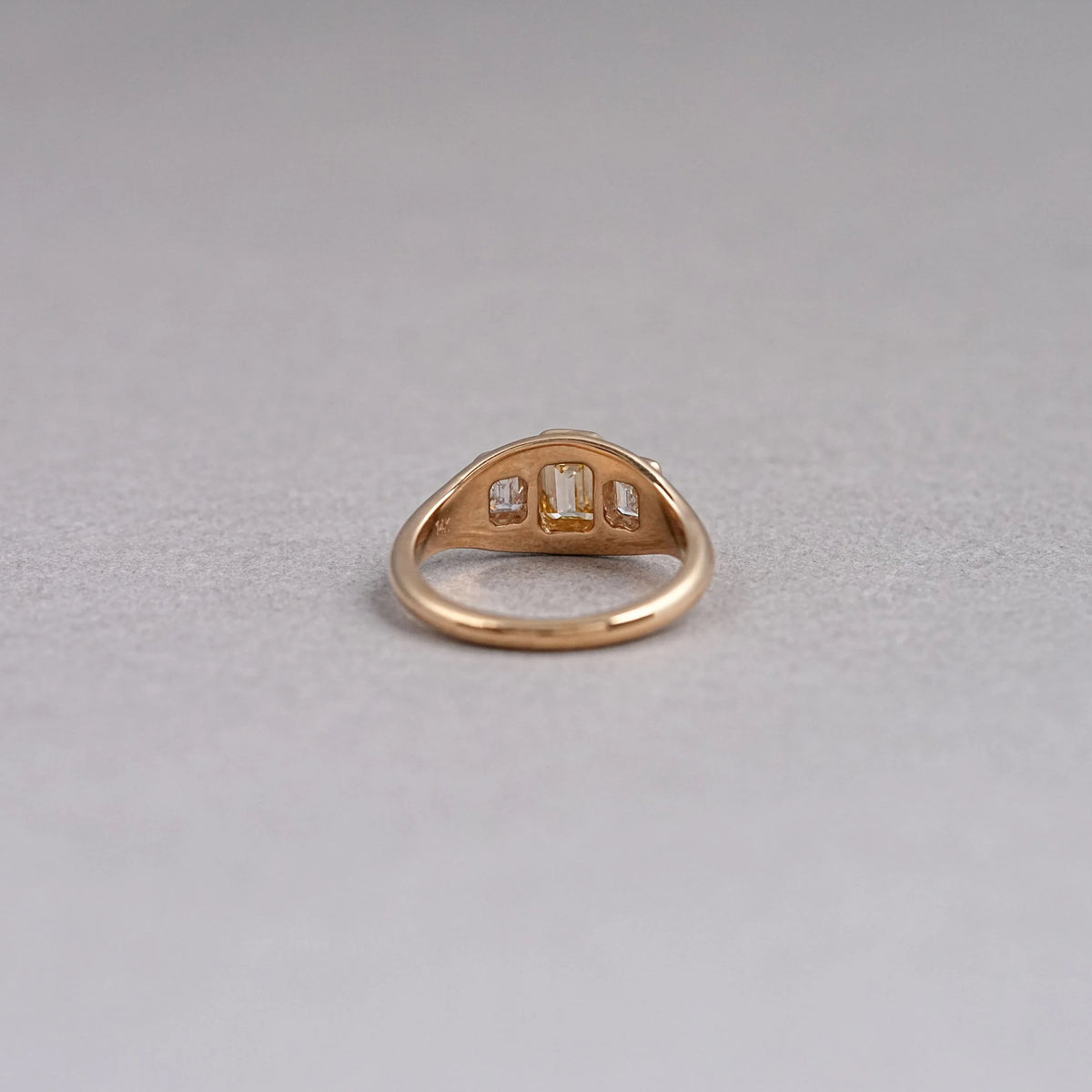 Bezel Set Yellow Emerald Cut 3 Stone Diamond Ring