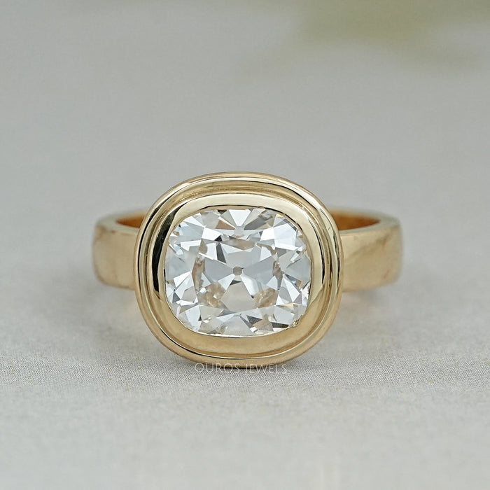 top view of old mine cushion cut lab diamond bezel solitaire engagement ring