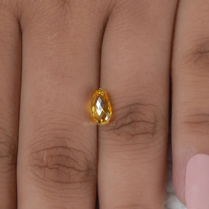 1.80 carat yellow briolette cut lab created diamond loose on hand