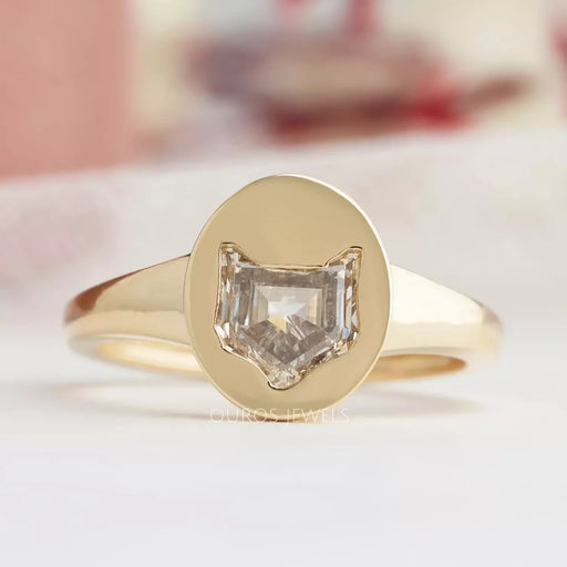 top view of cat face lab diamond bezel set engagement ring