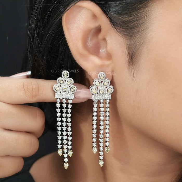 multi shaped man made diamonds chandelier earrings silver on ear and hand