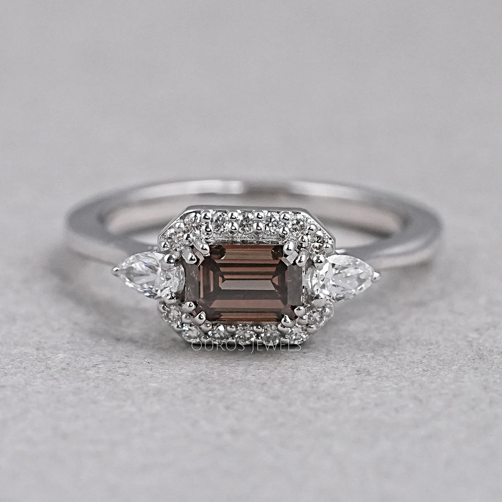 front view of chocolate emerald-cut diamond three-stone colored engagement ring
