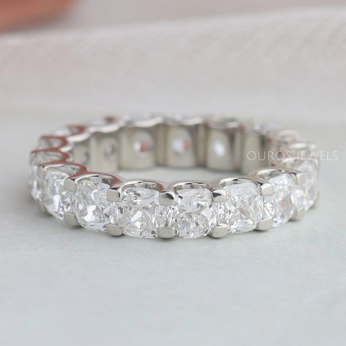 front view of cushion cut lab grown diamond eternity band white gold