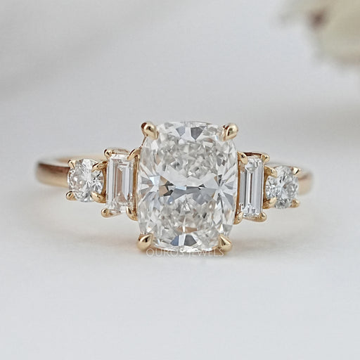 front view of elongated cushion and baguette cut diamond five stone wedding ring