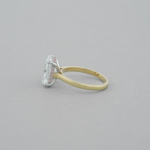 side view of cushion-cut lab diamond pink hidden halo solitaire colored wedding band