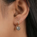 old european cut diamond prong setting two tone leverback earrings on ear