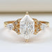 front view of dutch marquise cut lab diamond three stone engagement ring