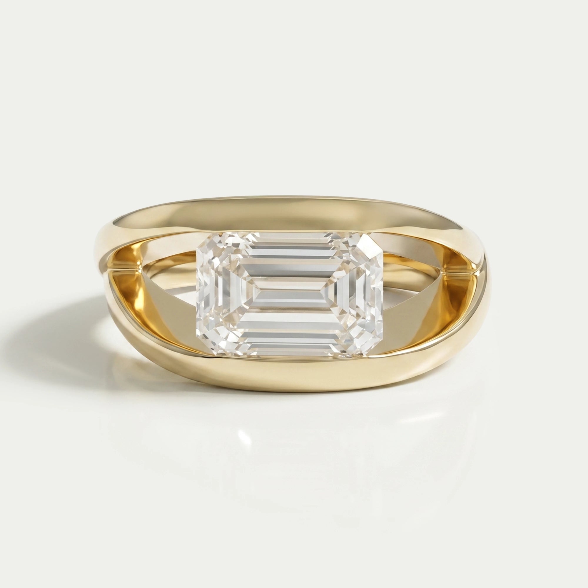East West Bezel Emerald Diamond Ring