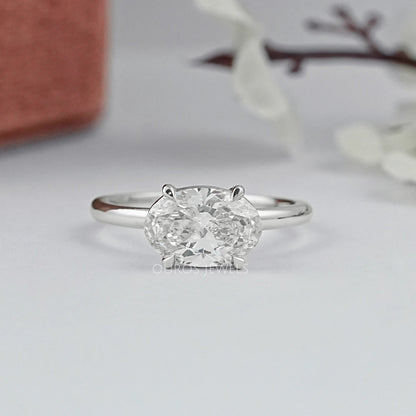 Pear Shaped Diamond Solitaire Bezel Set Ring