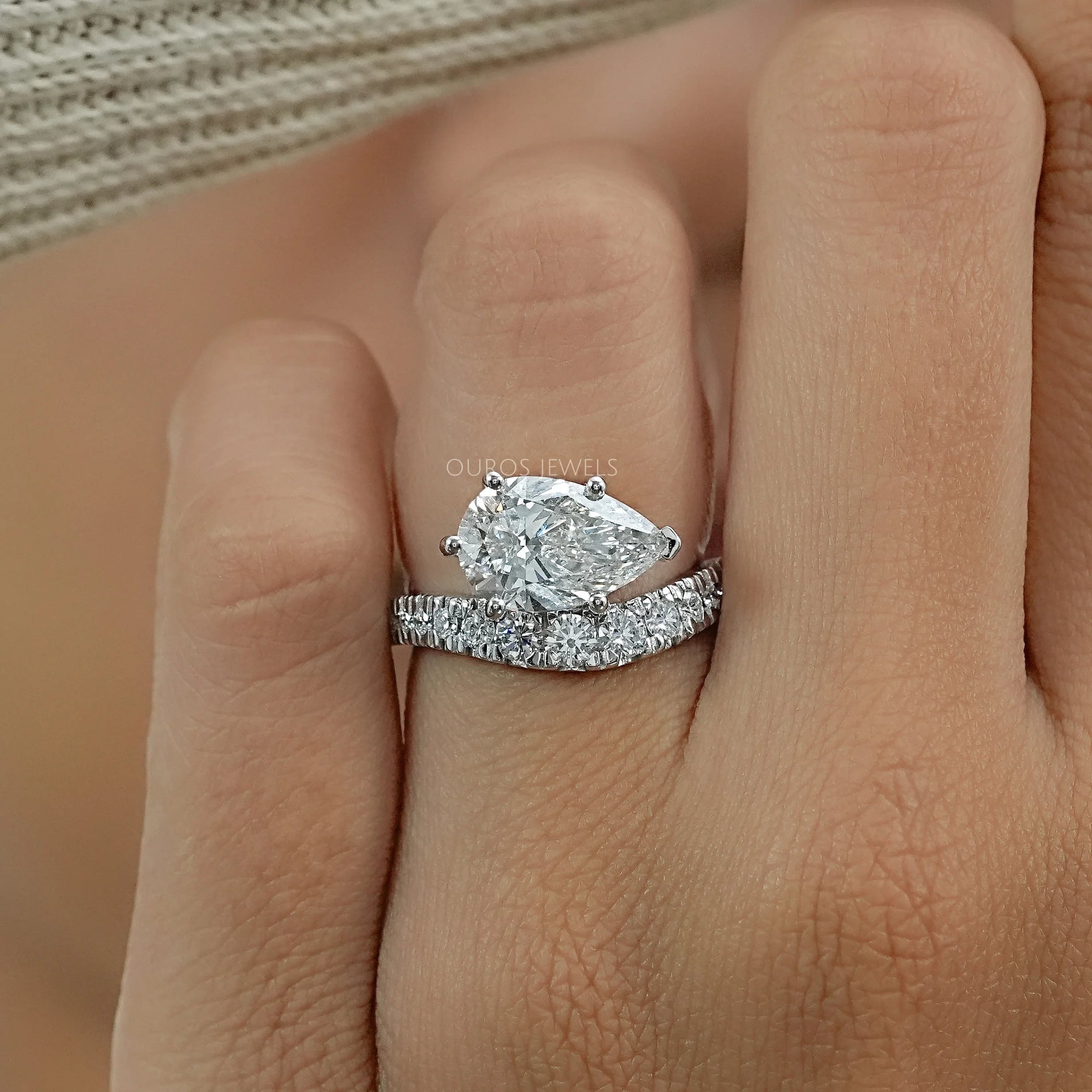 East West Pear Cut Diamond Wave Ring Ring