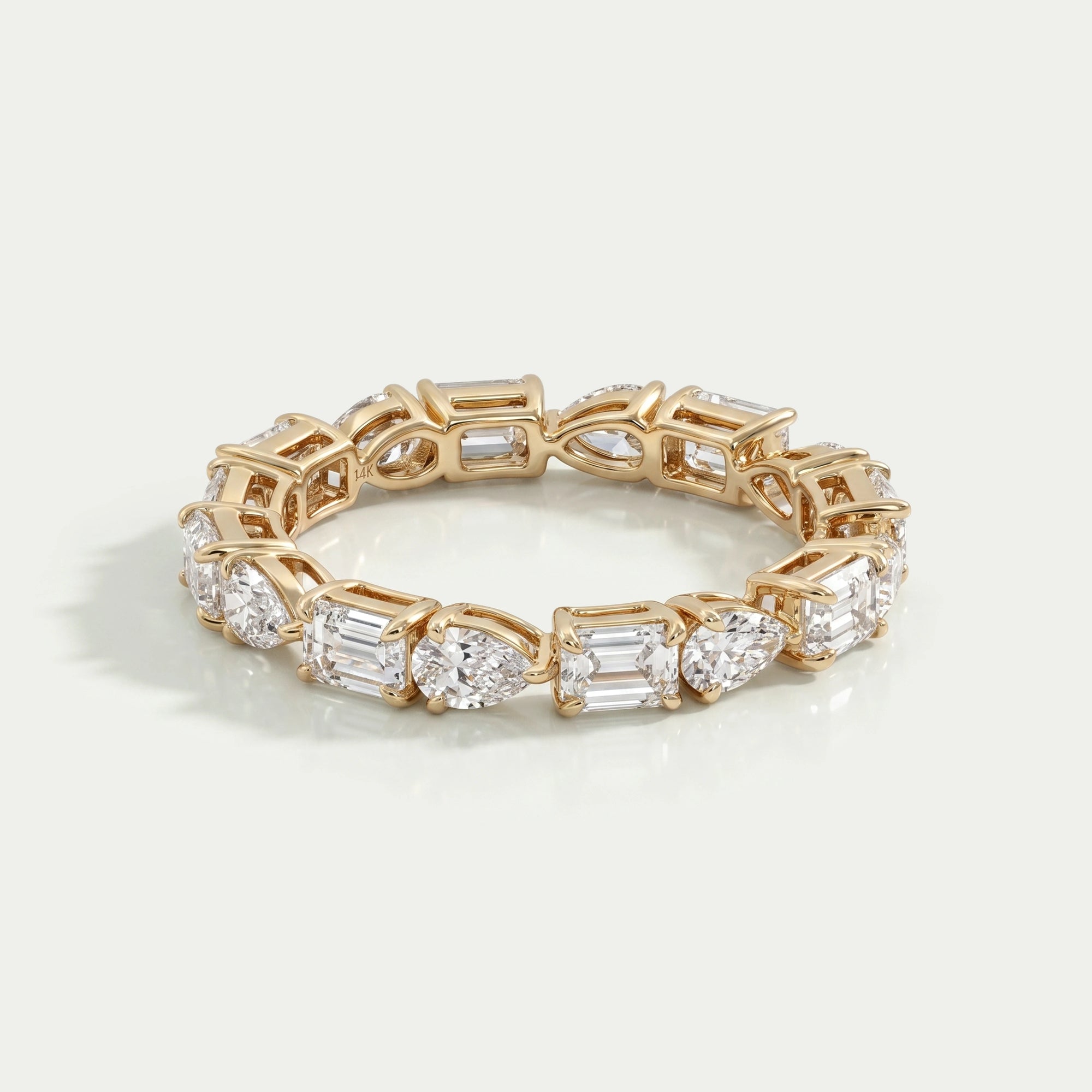 East West Pear And Emerald Diamond Eternity Wedding Band