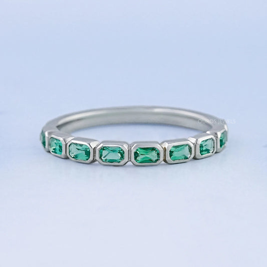 Oval Emerald And Lab Grown Diamond Half Eternity Band