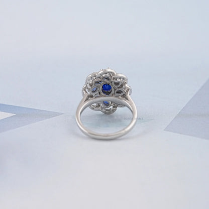 Blue Sapphire and Diamond Floral Halo Ring