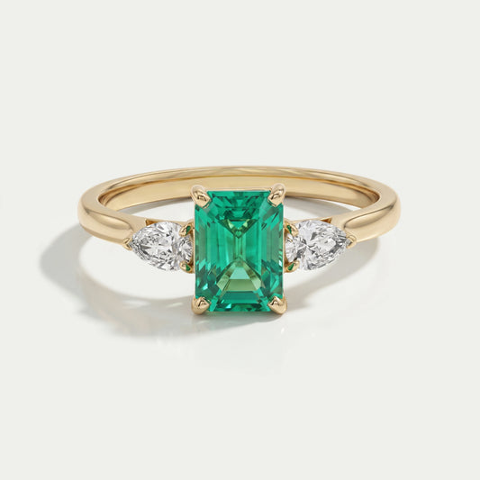 Emerald Gemstone And Pear Diamond Trio Engagement Ring Rings