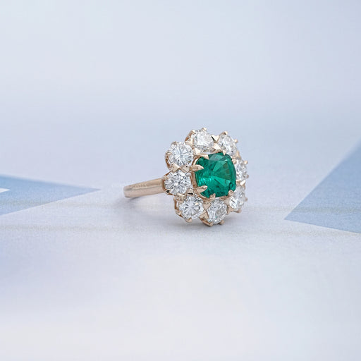 side view of emerald square green cushion gemstone round halo floral engagement ring