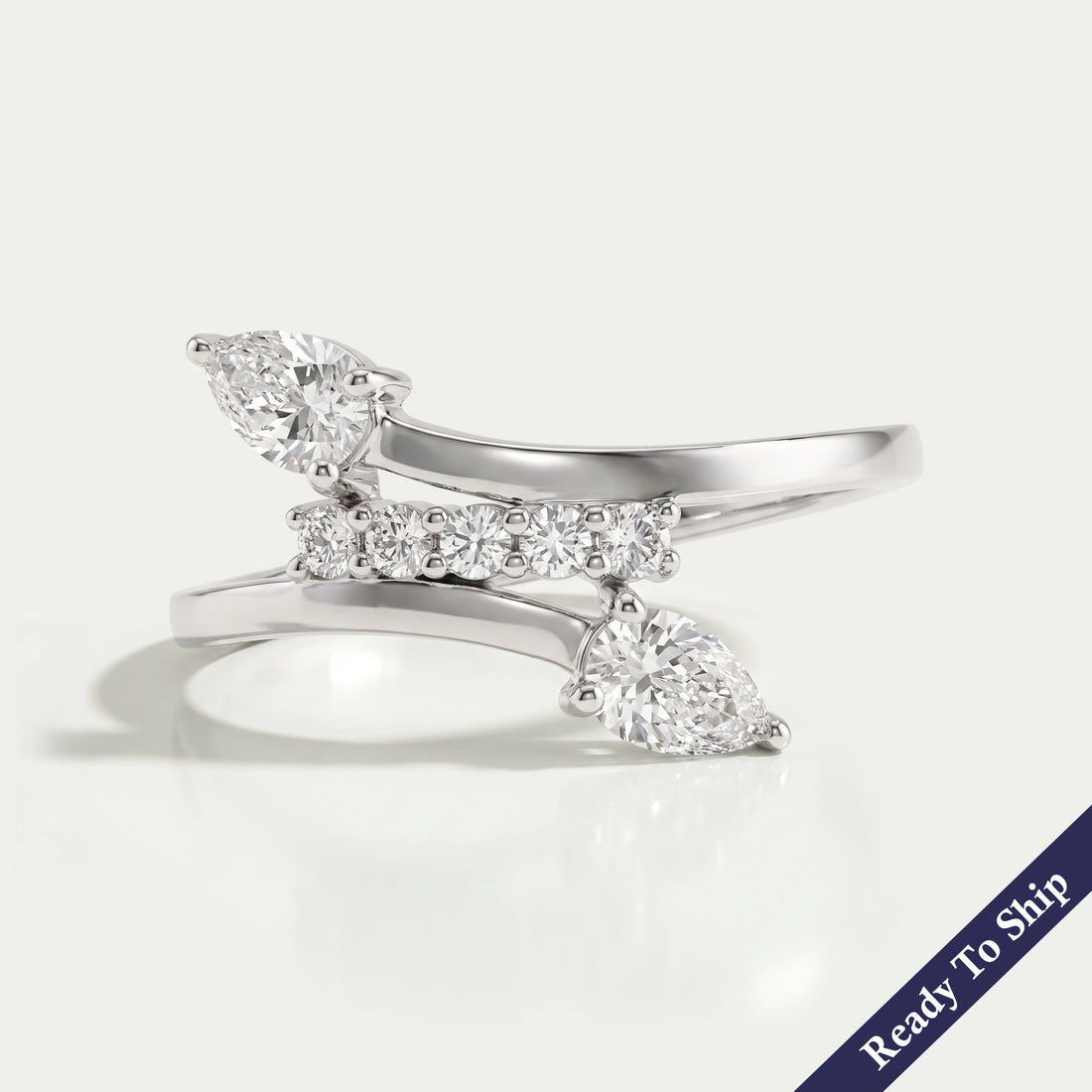 Pear And Round Cut Cluster Diamond Bypass Ring