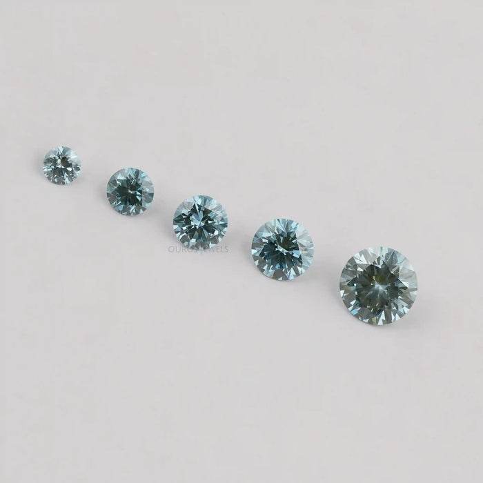 top view of blue round cut lab grown colored diamonds loose