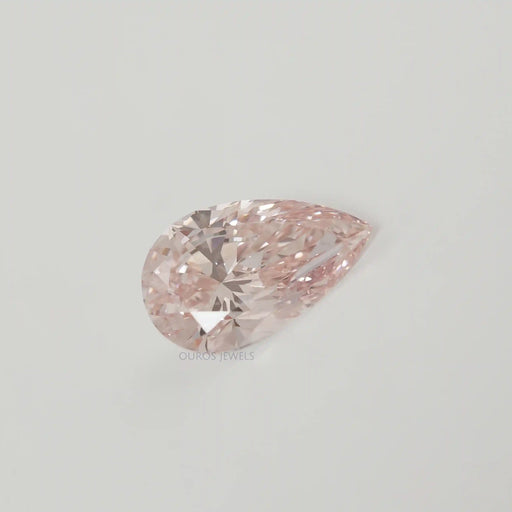 side view of 5.10 carat pear cut lab grown pink diamond loose