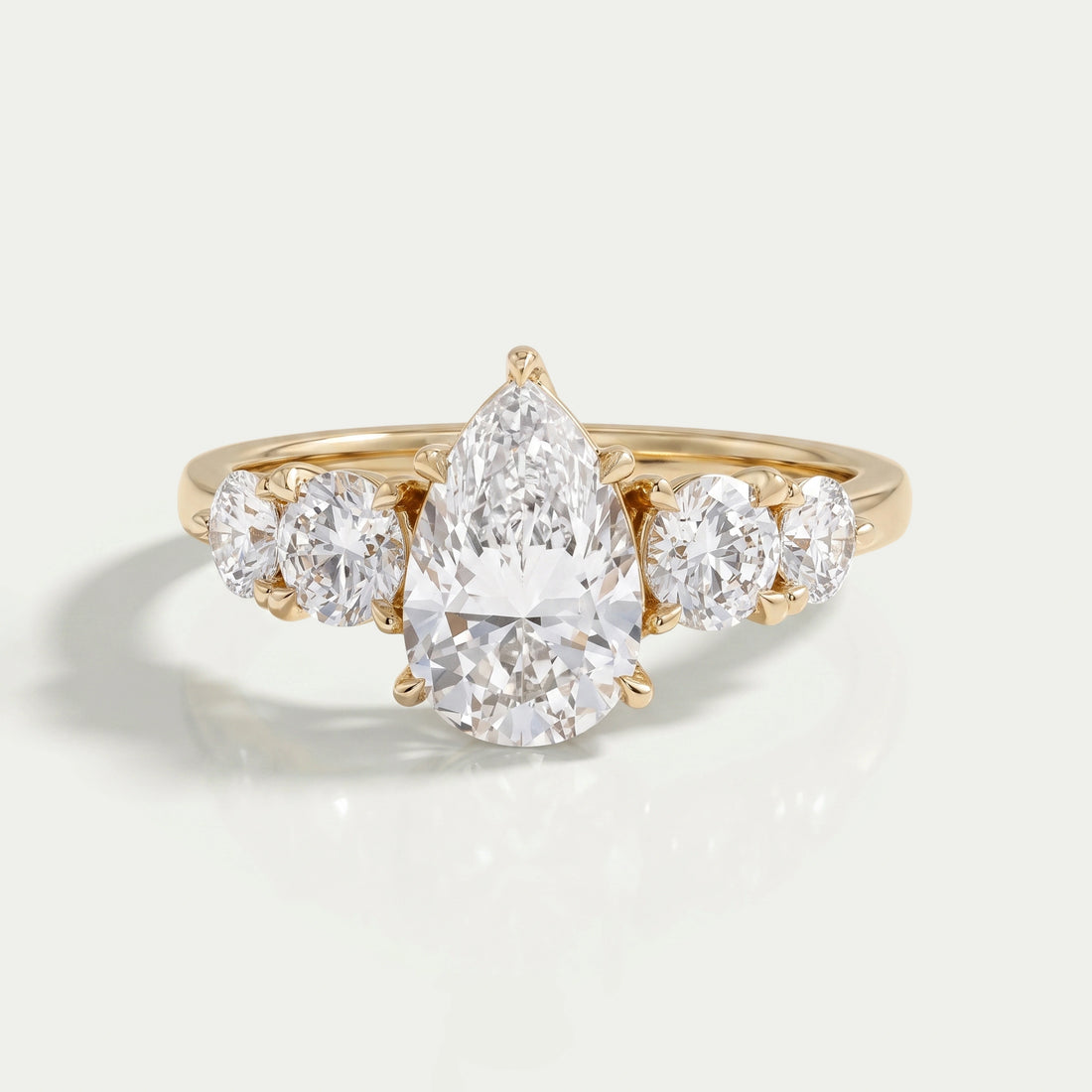 Pear And Round Diamond Five Stone Engagement Ring Rings