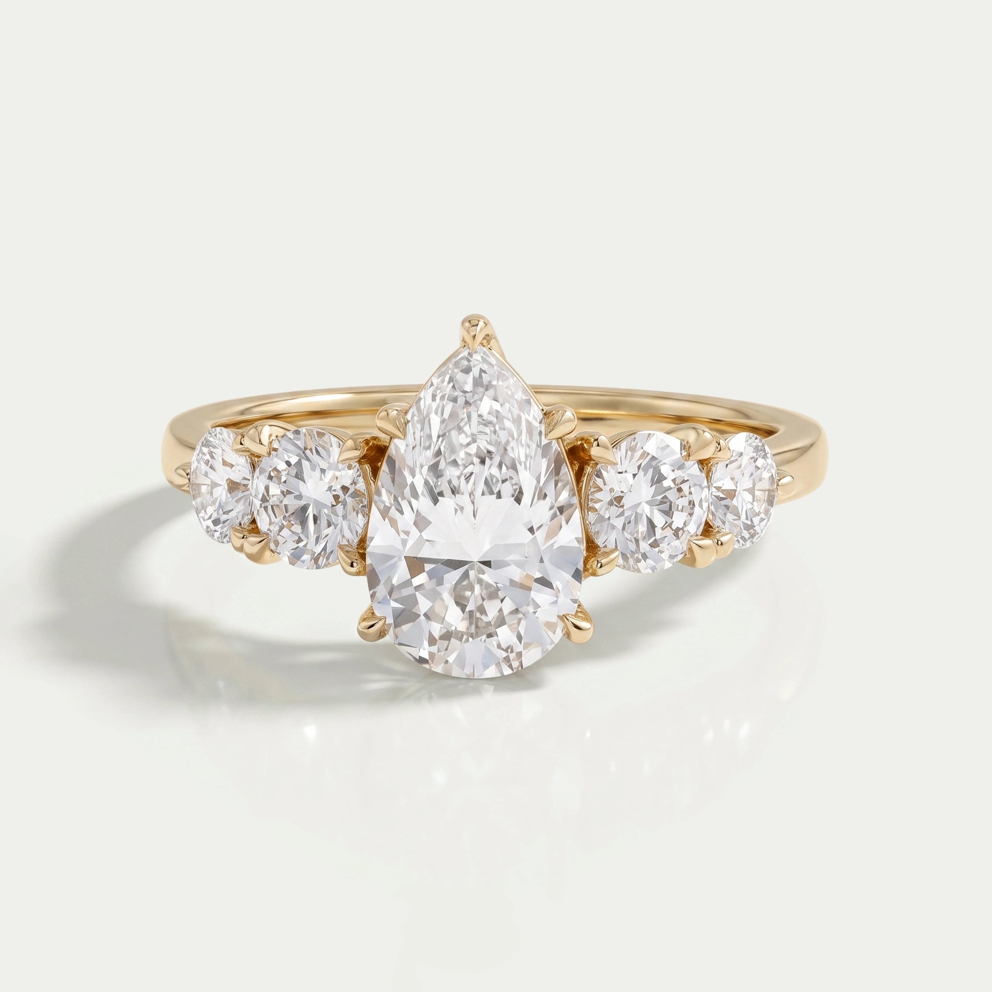 Pear And Round Diamond Five Stone Engagement Ring Rings