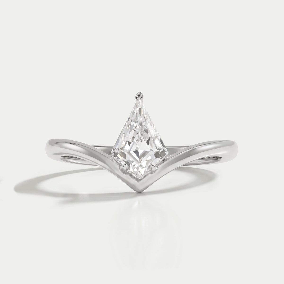 Kite Cut Curved Solitaire Engagement Ring