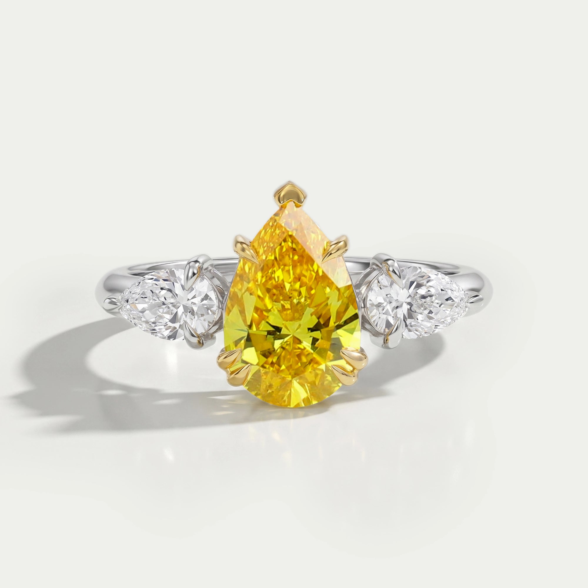 Yellow Pear Shaped Three Stone Diamond Ring